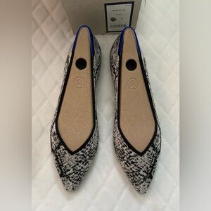 NWT Rothy’s pointed toe flats. Size 7. Python.